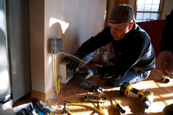 Long Beach, N.Y., Nov. 24, 2012 -- Electricians installing a heat register as part of the FEMA STEP Program. FEMA in conjunction with state, local and tribal partners, is implementing a Sheltering and Temporary Essential Power (STEP) Program to help people get back into their homes quickly and safely. STEP assists State, local and tribal governments in performing work and services essential to saving lives, protecting public health and safety, and protecting property. The program funds certain necessary and essential measures to help restore power, heat and hot water to primary residences that could regain power through necessary and essential repairs. STEP can help residents safely shelter-in-place in their homes pending more permanent repairs. FEMA is working with many partners including federal, state, local and tribal governments, voluntary faith-based and community-based organizations along with the private sector to assist residents impacted by Hurricane Sandy.