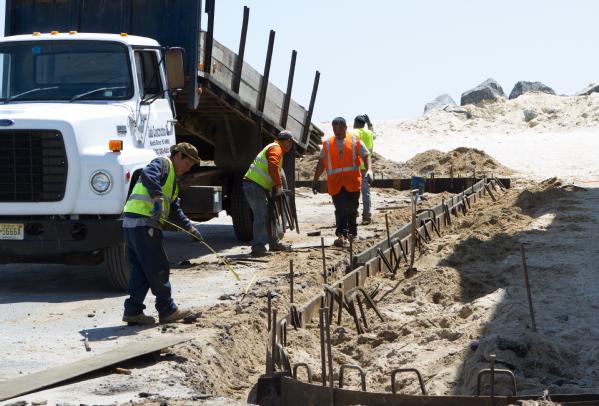 Bay Head, N.J., May 14, 2013 --A construction crew rebuilds one of several concrete walkways for beach access in Bay Head as part of the rebuilding and recovery process following Hurricane Sandy. 