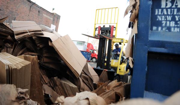 Brooklyn, N.Y., Dec. 4, 2012 -- Local Red Hook business, Cornell Paper and Box Company, continues cleanup of boxes at the warehouse that was flooded during Hurricane Sandy. Business impacted by the storm may contact the Small Business Administration (SBA) for low-interest disaster loans at all New York State/FEMA disaster recovery centers and 18 SBA business recovery centers.